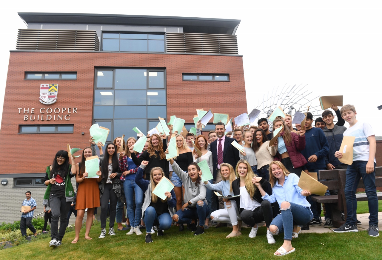  record breaking gcse results students with David Lloyd, Headmaster